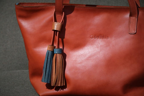 Bijou de sac pompons